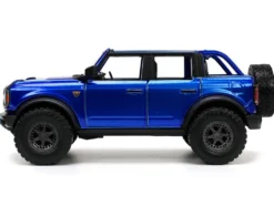 2021 Ford Bronco Open-Top Candy Blue Metallic with Extra Wheels "Just Trucks" Series 1/24 Diecast Model Car by Jada