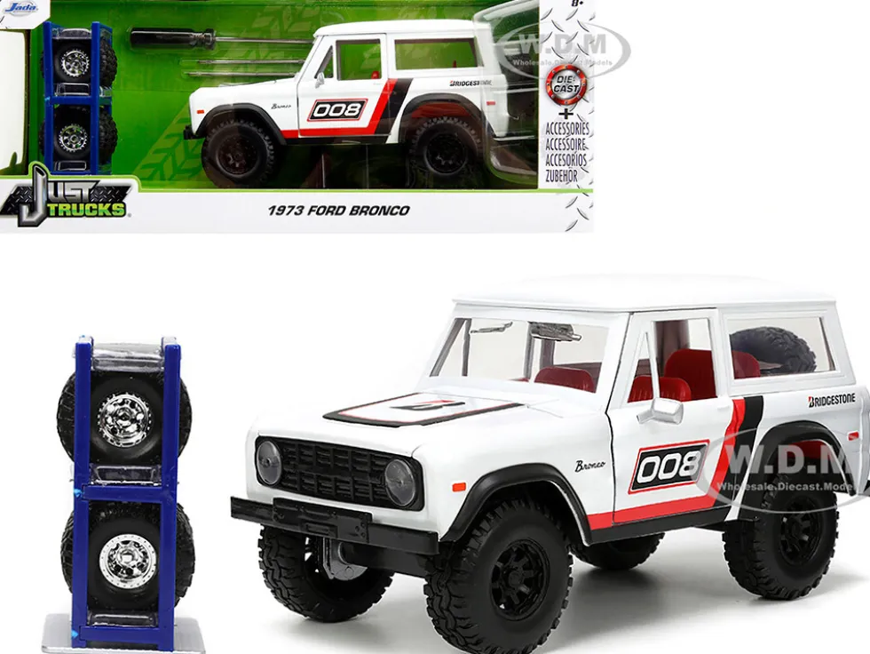 1973 Ford Bronco #008 White with Red and Black Stripes and Red Interior with Extra Wheels Just Trucks Series 1/24 Diecast Model Car Jada 34181