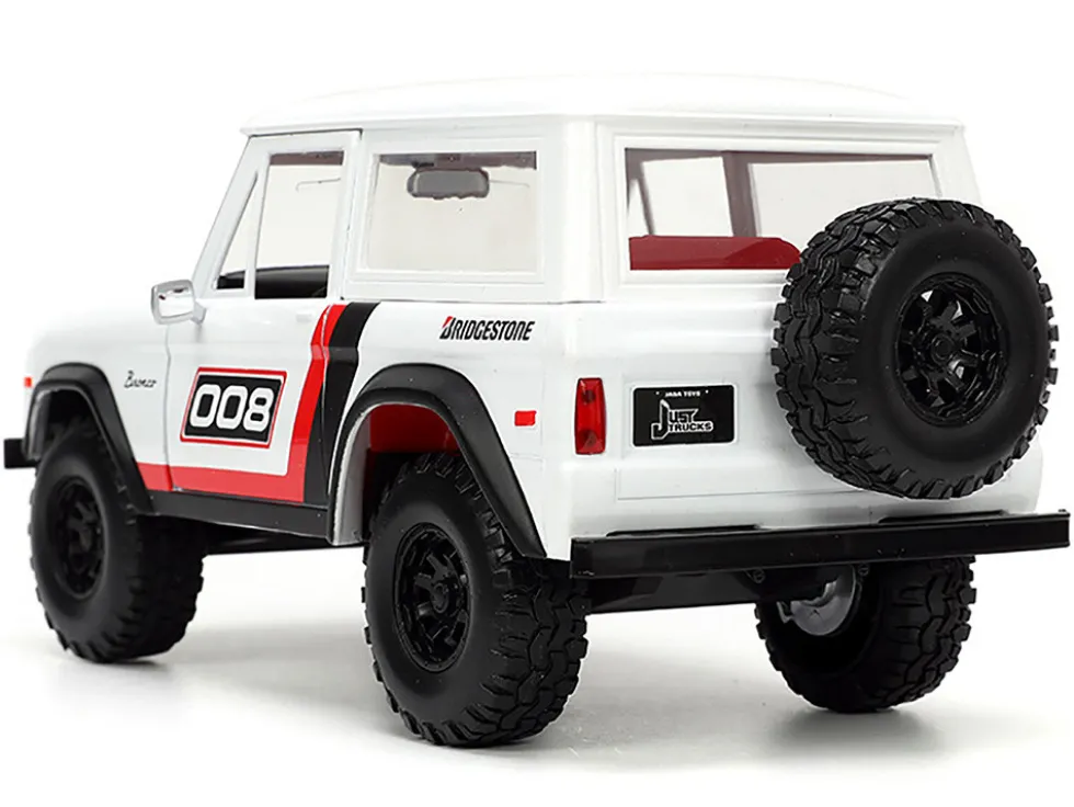1973 Ford Bronco #008 White with Red and Black Stripes and Red Interior with Extra Wheels Just Trucks Series 1/24 Diecast Model Car Jada 34181