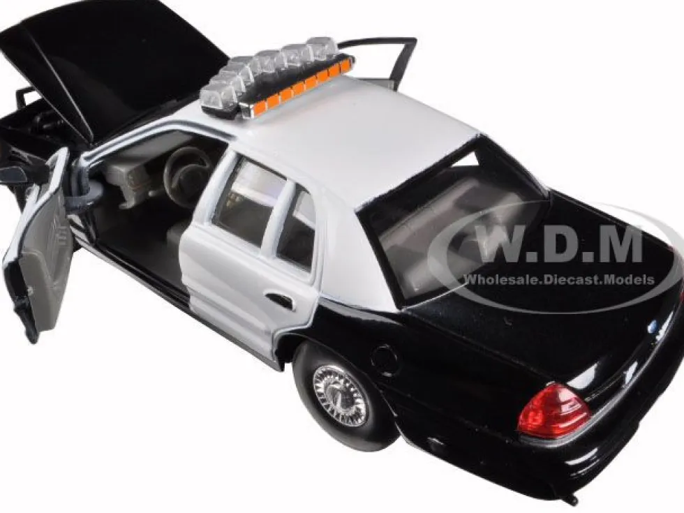 1999 Ford Crown Victoria Unmarked Police Car Black/White In Display Case with Light Bar and Push Bar 1/24 Diecast Model Car Welly SH2082S-BSW