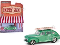 1946 Ford Fordor Super Deluxe Green Metallic with White Interior and Roof Rack with Surfboards "The Hobby Shop" Series 16 1/64 Diecast Model Car by Greenlight