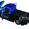 1956 Ford F 100 Pickup Truck Black and Blue Metallic with Ford Graphics Just Trucks Series 1/24 Diecast Model Car Jada 34307