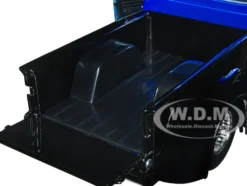 1956 Ford F 100 Pickup Truck Black and Blue Metallic with Ford Graphics Just Trucks Series 1/24 Diecast Model Car Jada 34307