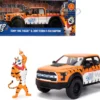 2017 Ford F-150 Raptor Pickup Truck "Frosted Flakes" Orange with Graphics and Tony the Tiger Diecast Figure "Hollywood Rides" Series 1/24 Diecast Model by Jada