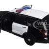 2015 Ford Interceptor Unmarked Police Car Black/White 1/24 Diecast Model Car Motormax 76958