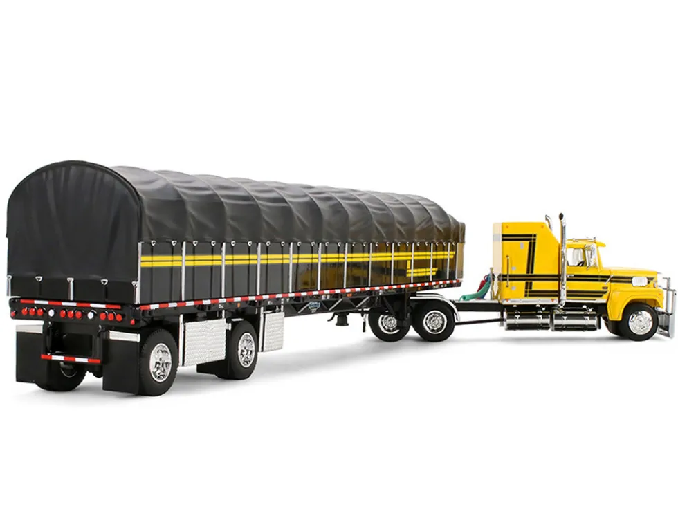 Ford LTL 9000 with 60" Aerodyne Sleeper and 53' Wilson Roadbrute Flatbed Trailer with Covered Wagon Yellow with Black Stripes 1/64 Diecast Model by DCP/First Gear