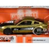 2010 Ford Mustang GT Gold Metallic with Black Graphics and Hood Tom s Racing Bigtime Muscle Series 1/24 Diecast Model Car Jada 33055