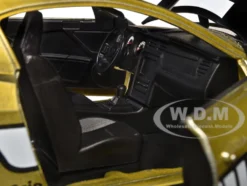 2010 Ford Mustang GT Gold Metallic with Black Graphics and Hood Tom s Racing Bigtime Muscle Series 1/24 Diecast Model Car Jada 33055