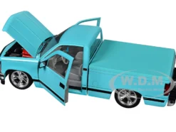 1988 GMC Sierra 1500 Custom Pickup Truck Light Blue with Black Stripes Limited Edition to 9250 pieces Worldwide 1/24 Diecast Model Car by M2 Machines