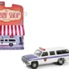 1985 GMC Suburban 2500 "New York City Transit Police Department" White with Blue Stripes and Police Officer Figure "The Hobby Shop" Series 16 1/64 Diecast Model Car by Greenlight