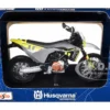 2023 Husqvarna 701 Supermoto Motorcycle Matt Black and Gray with Yellow and White Accents with Display Base 1/12 Diecast Model by Maisto