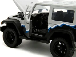 2007 Jeep Wrangler Gray and Black with Blue and White Stripes with Extra Wheels Just Trucks Series 1/24 Diecast Model Car Jada 34194