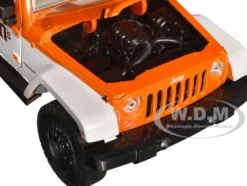 2017 Jeep Wrangler Orange Metallic White Orange M&M Diecast Figure M&M's Hollywood Rides Series 1/24 Diecast Model Car Jada 34401