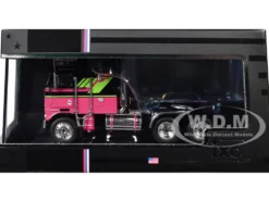 1976 Kenworth K100 Aerodyne Truck Tractor Black and Pink with Graphics 1/64 Diecast Model by IXO Models
