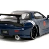 1993 Mazda RX 7 Dark Blue with Green Hood and Kakashi Hatake Diecast Figure Naruto Shippuden 2009 2017 TV Series Anime Hollywood Rides Series 1/24 Diecast Model Car Jada 34370