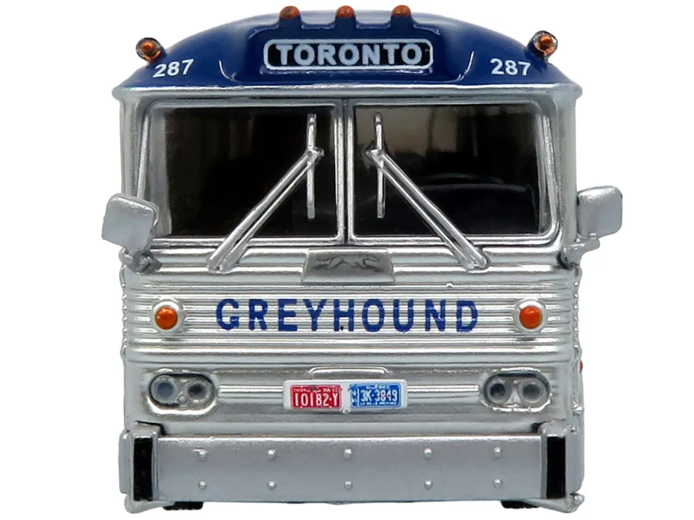 1964 MCI MC-5A Coach Bus "Greyhound Canada" White with Blue Stripes "Vintage Bus & Motorcoach Collection" Limited Edition to 504 pieces Worldwide 1/87 (HO) Diecast Model by Iconic Replicas