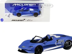 McLaren Elva Convertible #26 Matt Blue with White Stripes Extra Wheels 1/64 Diecast Model Car CM Models CM64-ELVA-01