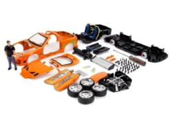 Model Kit Toyota Supra Metallic Orange Brian Diecast Figure Fast & Furious Movie Build N' Collect 1/24 Diecast Model Car Jada 30699