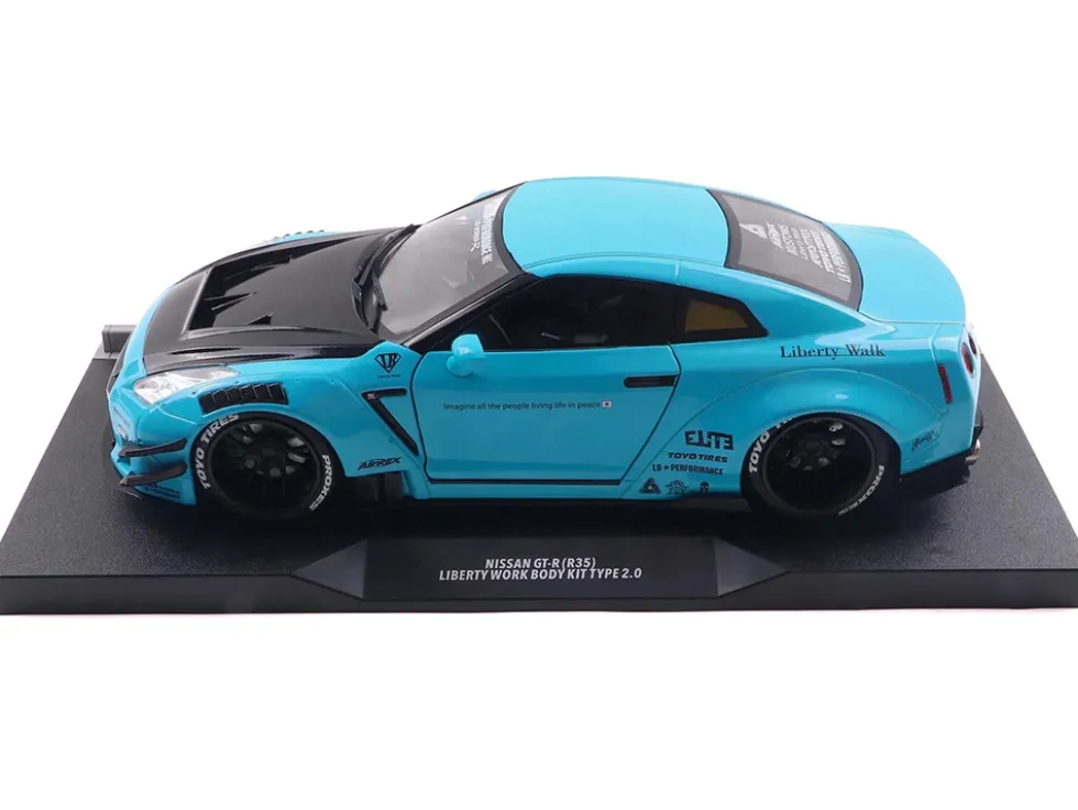 2023 Nissan GT-R (R35) Liberty Walk Body Kit 2.0 RHD (Right Hand Drive) Baby Blue with Carbon Hood 1/18 Diecast Model Car by Solido