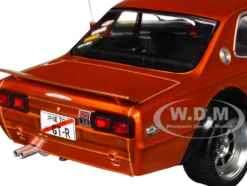 1970 Nissan Skyline (C10) Hakosuka RHD (Right Hand Drive) Orange Metallic 1/18 Diecast Model Car by Solido