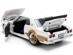 1971 Nissan Skyline 2000GT-R RHD (Right Hand Drive) White with Gold Graphics "JDM Tuners" Series 1/24 Diecast Model Car by Jada