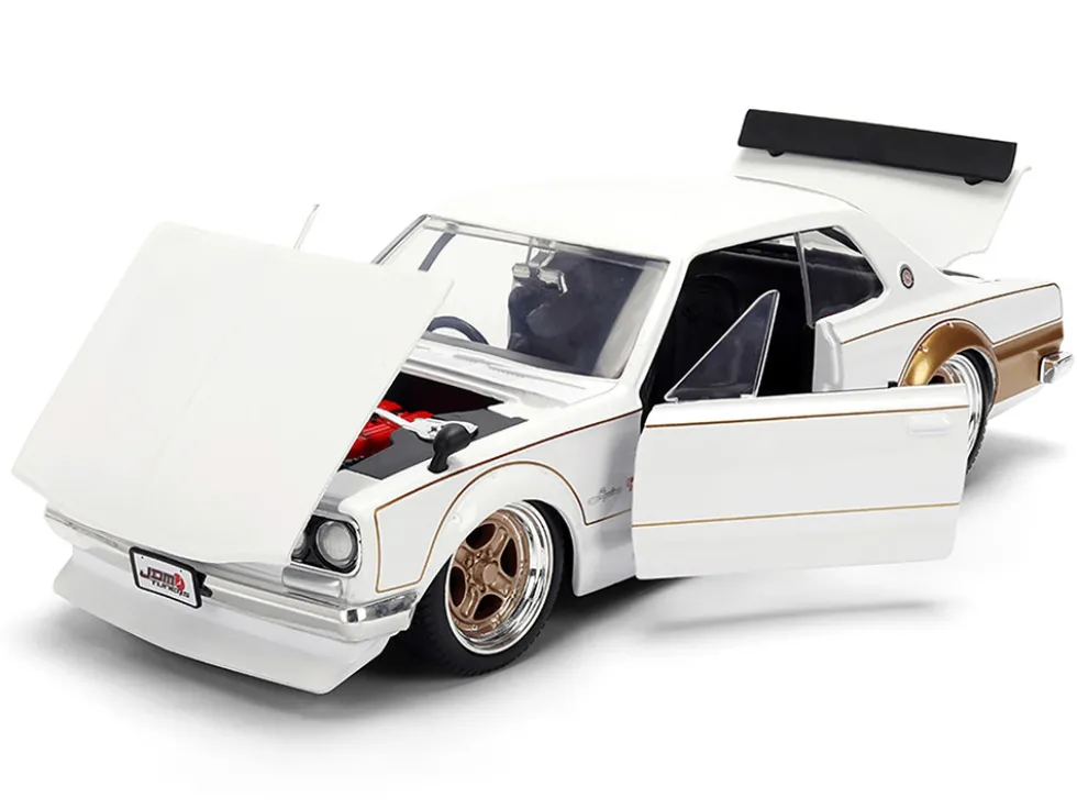 1971 Nissan Skyline 2000GT-R RHD (Right Hand Drive) White with Gold Graphics "JDM Tuners" Series 1/24 Diecast Model Car by Jada