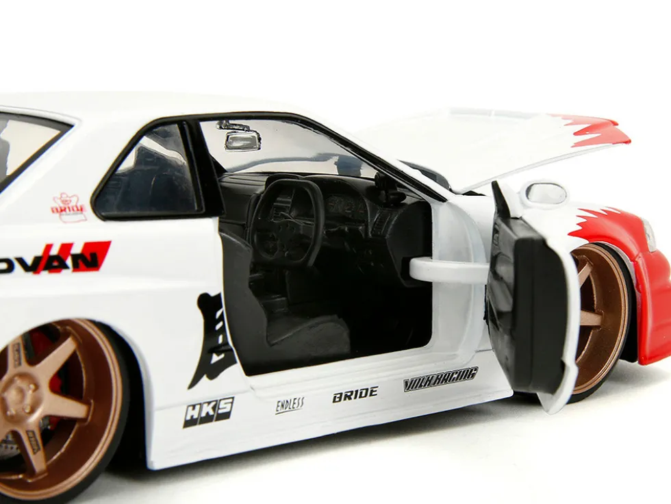 2002 Nissan Skyline GT-R (R34) RHD (Right Hand Drive) White with Red Graphics and Ryu Diecast Figure "Street Fighter" Video Game "Anime Hollywood Rides" Series 1/24 Diecast Model Car by Jada