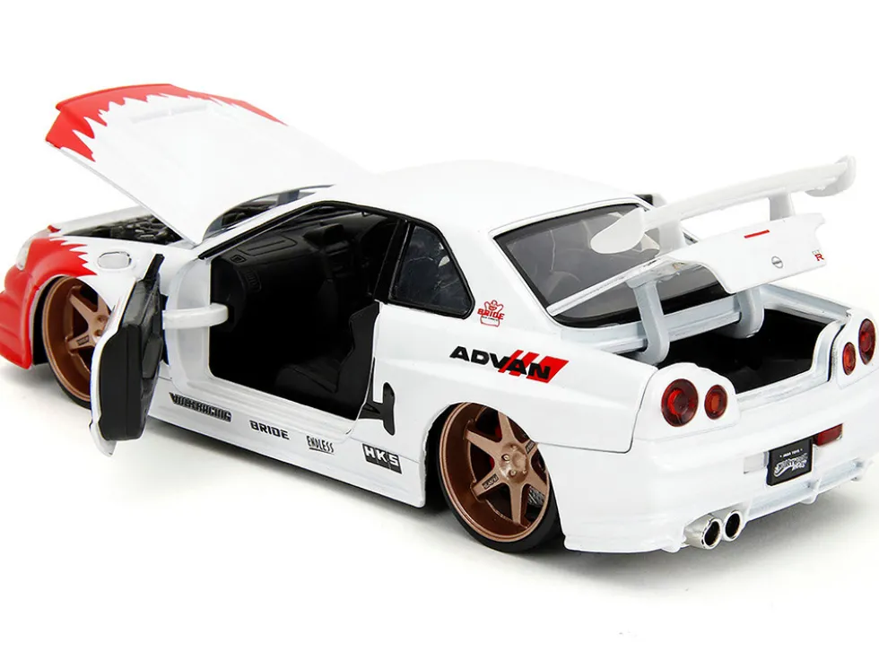 2002 Nissan Skyline GT-R (R34) RHD (Right Hand Drive) White with Red Graphics and Ryu Diecast Figure "Street Fighter" Video Game "Anime Hollywood Rides" Series 1/24 Diecast Model Car by Jada