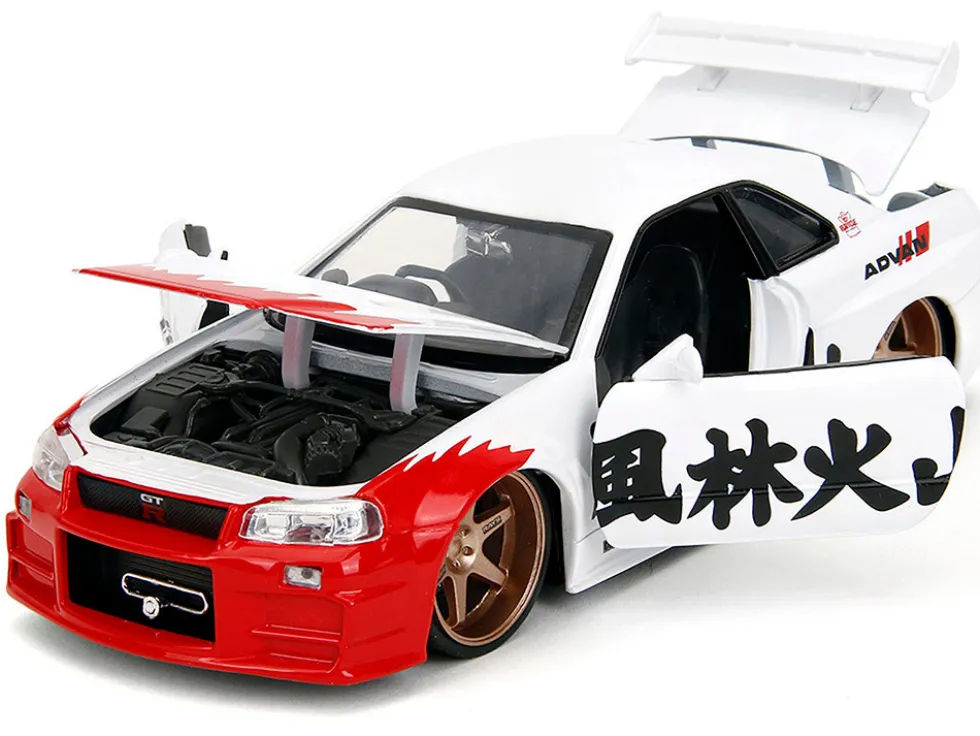 2002 Nissan Skyline GT-R (R34) RHD (Right Hand Drive) White with Red Graphics and Ryu Diecast Figure "Street Fighter" Video Game "Anime Hollywood Rides" Series 1/24 Diecast Model Car by Jada