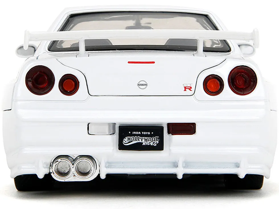 2002 Nissan Skyline GT-R (R34) RHD (Right Hand Drive) White with Red Graphics and Ryu Diecast Figure "Street Fighter" Video Game "Anime Hollywood Rides" Series 1/24 Diecast Model Car by Jada