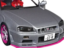 1999 Nissan Skyline GT-R (R34) RHD (Right Hand Drive) Silver Metallic with Purple Wheels 1/18 Diecast Model Car by Solido