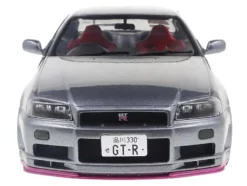 1999 Nissan Skyline GT-R (R34) RHD (Right Hand Drive) Silver Metallic with Purple Wheels 1/18 Diecast Model Car by Solido
