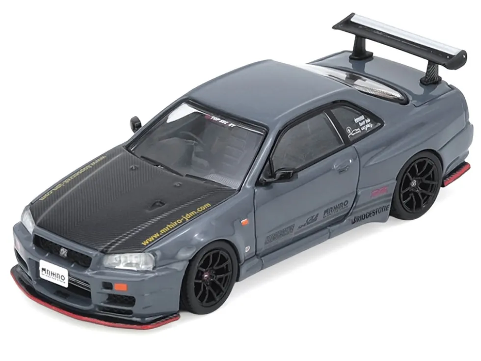 Nissan Skyline GT-R (R34) "Top Secret" RHD (Right Hand Drive) Stealth Gray with Carbon Hood "GTSHOW 2025 Event Edition" 1/64 Diecast Model Car by Inno Models