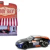 2020 Nissan 370z "NOS Nitrous Oxide Systems" Black with Graphics and Race Car Driver "The Hobby Shop" Series 16 1/64 Diecast Model Car by Greenlight
