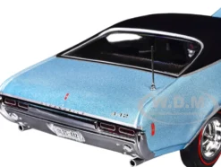 1968 Oldsmobile 442 W30 Holiday Coupe Teal Frost Metallic with Red Stripes and Black Vinyl Top