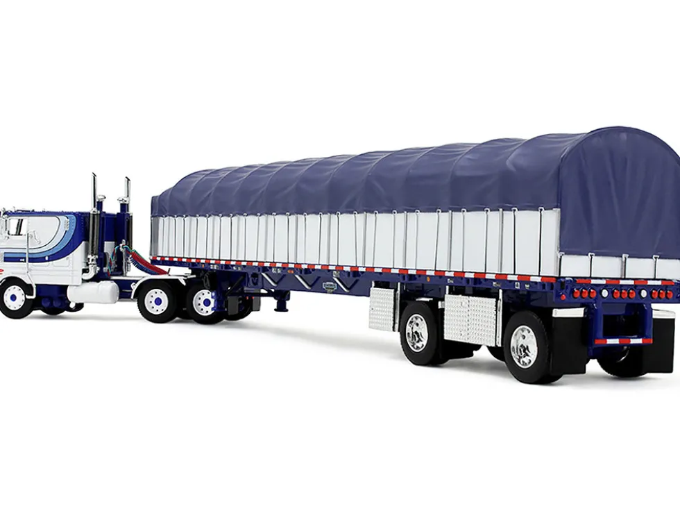 Peterbilt 352 COE 110" Sleeper and 53’ Wilson Roadbrute Flatbed Trailer with Covered Wagon White with Blue Stripes 1/64 Diecast Model by DCP/First Gear