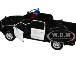 2019 RAM 1500 Laramie Crew Cab Pickup Truck Black and White with Flashing Light Bar and Front and Rear Lights and Sounds 1/27 Diecast Model Car by Motormax