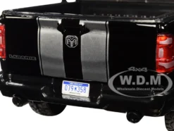 2019 RAM 1500 Laramie Crew Cab Pickup Truck Black Silver Stripes 1/24 Diecast Model Car Motormax 79357