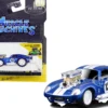 1965 Shelby Daytona Coupe #13 Blue Metallic with White Stripes 1/64 Diecast Model Car Muscle Machines 15552bl