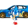 2012 Subaru Impreza WRX STI Blue Metallic with Graphics and Sonic The Hedgehog Diecast Figure "Sonic The Hedgehog" "Hollywood Rides" Series 1/24 Diecast Model Car by Jada