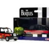The Beatles London Taxi RHD (Right Hand Drive) "Eleanor Rigby - Yellow Submarine" Black and Red with Graphics Diecast Model Car by Corgi