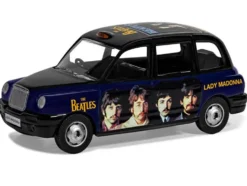 The Beatles London Taxi RHD (Right Hand Drive) "Lady Madonna" Black and Dark Blue with Graphics Diecast Model Car by Corgi