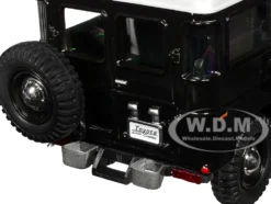 Toyota FJ40 Land Cruiser Black with White Top 1/24 Diecast Model Car Motormax 79323BK