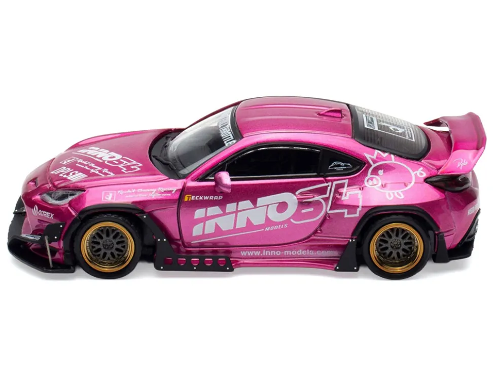 Toyota GR86 "Pandem Rocket Bunny" RHD (Right Hand Drive) Pink Metallic with Graphics "APA XPO 2025 Event Exclusive" 1/64 Diecast Model Car by Inno Models