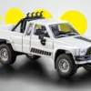 1985 Toyota Hilux SR5 Pickup Truck White with Black Graphics "Collection" Series 1/64 Diecast Model Car by Majorette