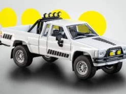 1985 Toyota Hilux SR5 Pickup Truck White with Black Graphics "Collection" Series 1/64 Diecast Model Car by Majorette