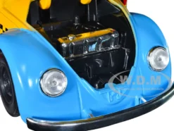 1959 Volkswagen Beetle Taxi Yellow Blue Oscar's Taxi Service Oscar Grouch Diecast Figure Sesame Street Hollywood Rides Series 1/24 Diecast Model Car Jada 32801