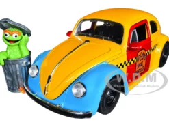 1959 Volkswagen Beetle Taxi Yellow Blue Oscar's Taxi Service Oscar Grouch Diecast Figure Sesame Street Hollywood Rides Series 1/24 Diecast Model Car Jada 32801