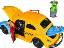 1959 Volkswagen Beetle Taxi Yellow Blue Oscar's Taxi Service Oscar Grouch Diecast Figure Sesame Street Hollywood Rides Series 1/24 Diecast Model Car Jada 32801