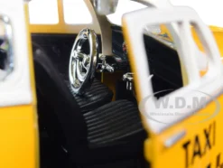 1966 Volkswagen Beetle Taxi Yellow White Top 1/24 Diecast Model Car Motormax 79577